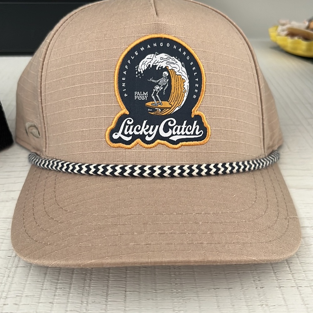 PAIR of New Palm Folly trucker hats